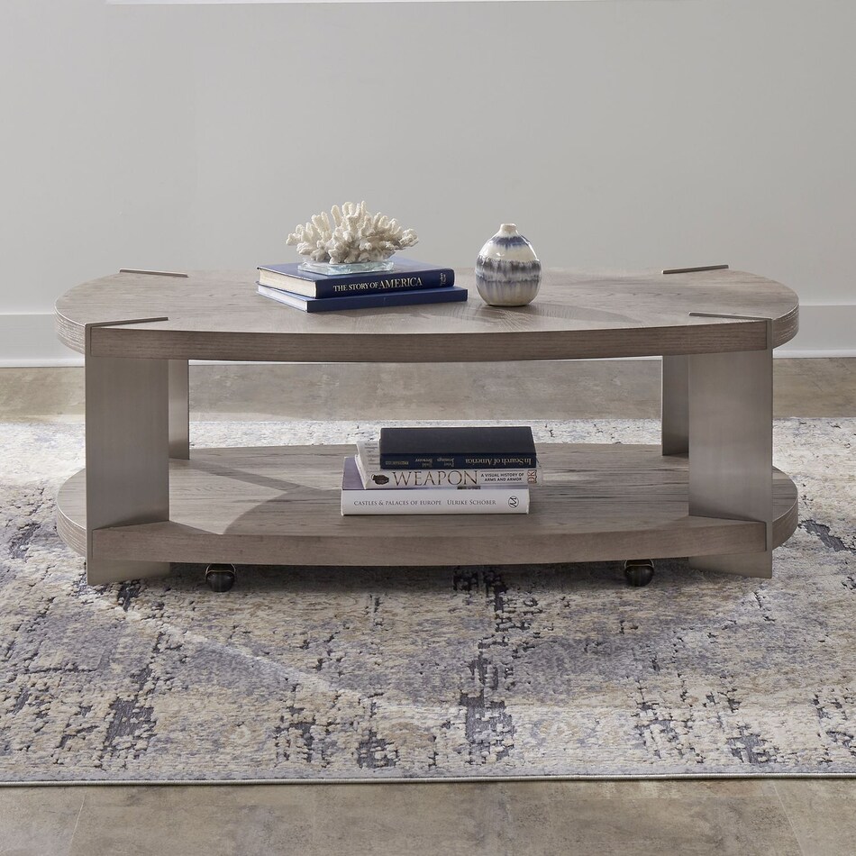 arrow sandstone and satin nickle cocktail table   