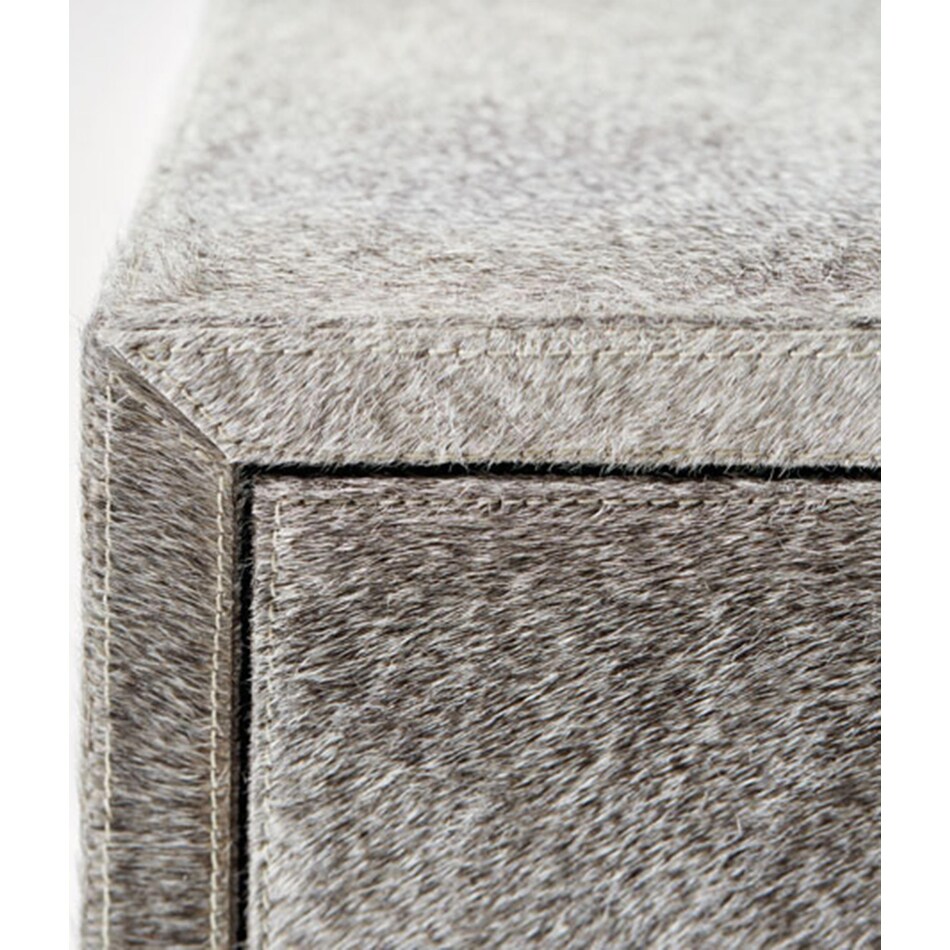 parkin gray hair on hide accent chest   